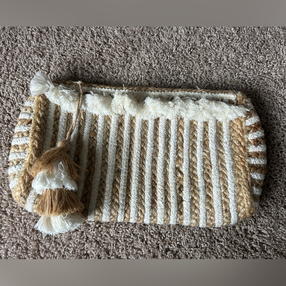 Large white and tan woven fringe clutch